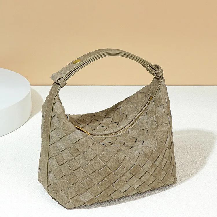 

Soft leather hand-woven bag, versatile and stylish, perfect for carrying, lunchbox, or casual shoulder/underarm use.