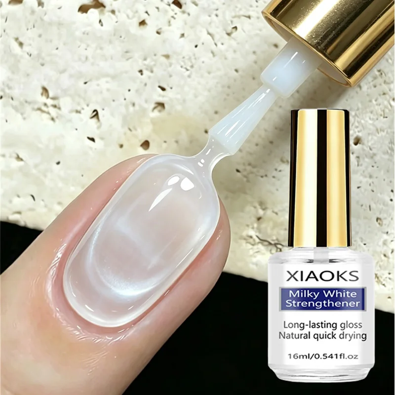 Milky White Enhancer, 16 Chambers, Enhances Texture to a Translucent Milky White, Thin Application Brings a Soft, Natural Glow. The Quick-Drying Formula Saves Time, Provides Long-Lasting Shine to the Nail Surface, and Smoothes Out Uneven Nail Lines. It Can Thicken Thin and Soft Nails, Repair Easily Broken and Layered Nails, and Strengthen the Nail Surface to Reduce Cracking. Daily Application of a Single Coat Creates a Clear, Natural Look Without Makeup, and Can Also Be Used as a Base Coat with Color Gel, Making It Easy to Use, Even for Beginners to Apply and Shape Nails Daily, and Is Suitable as a Gift for Female Friends.