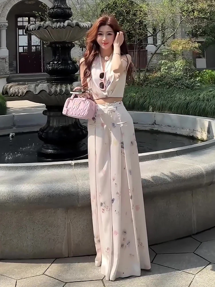 

Комплект: Женский модный летний костюм из полиэстера с широкими брюками с высокой талией и свободным топом с цветочным принтом. Новинка.