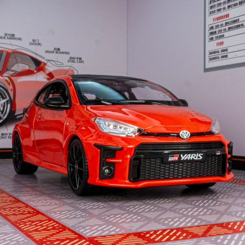 

Maisto 1:24 GR YORIS Simulated alloy car model can open the door static ornament to give boyfriend a gift