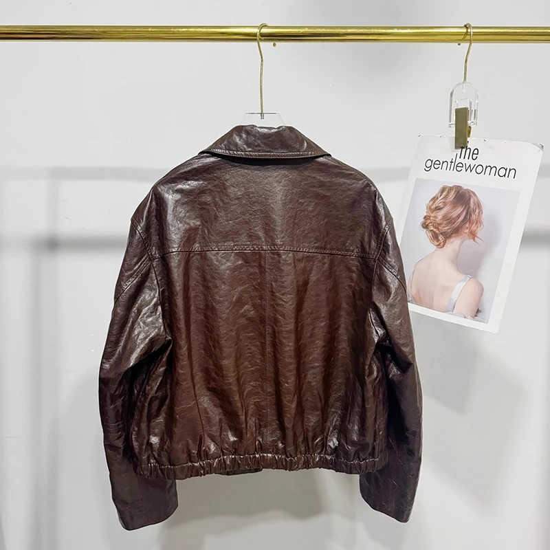 سترة نسائية لخريف وشتاء 2025 ملابس شعبية ملابس خارجية للنساء أسود/قهوة من جلد الغنم الطبيعي معطف قصير للدراجات النارية