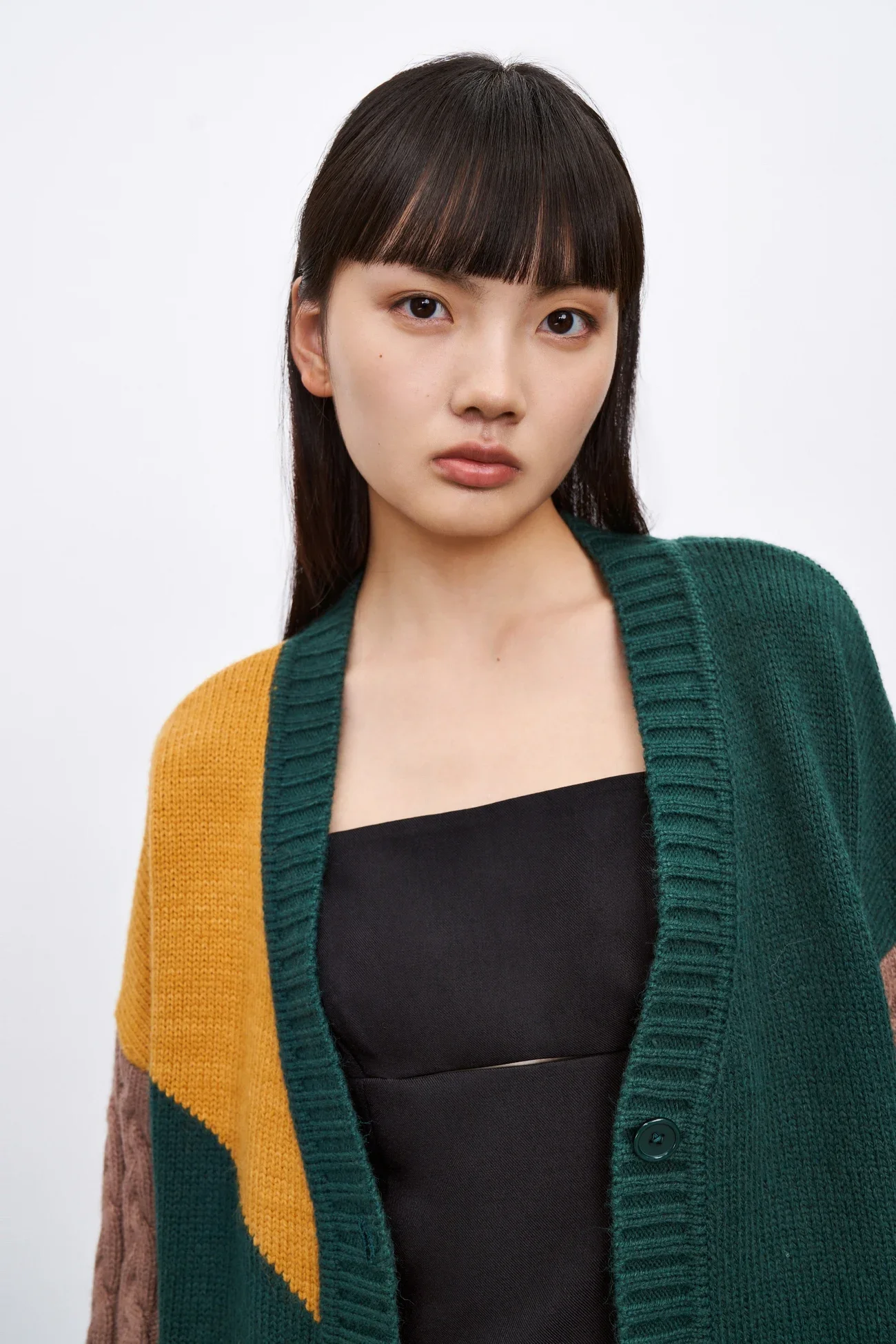 2025年春新作 レディース カジュアルでおしゃれなカラーブロックVネックセーター ニットコート