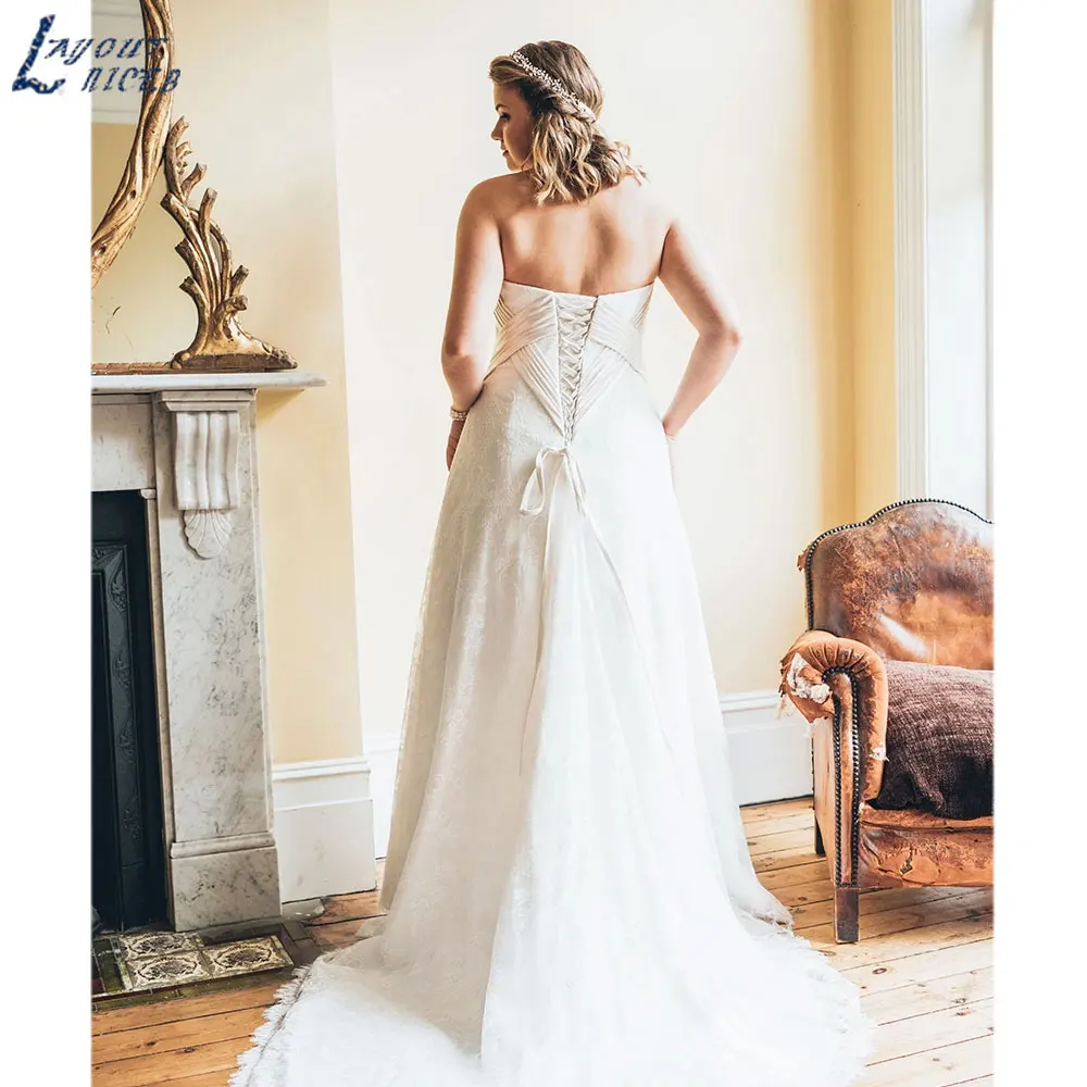 LAYOUT NICEB Plus Size abiti da sposa in pizzo senza spalline abito da sposa senza maniche senza schienale allacciato su misura suknia pollubna 2024LAYOUT NICEB Plus Size abiti da sposa in pizzo senza spalline abito da