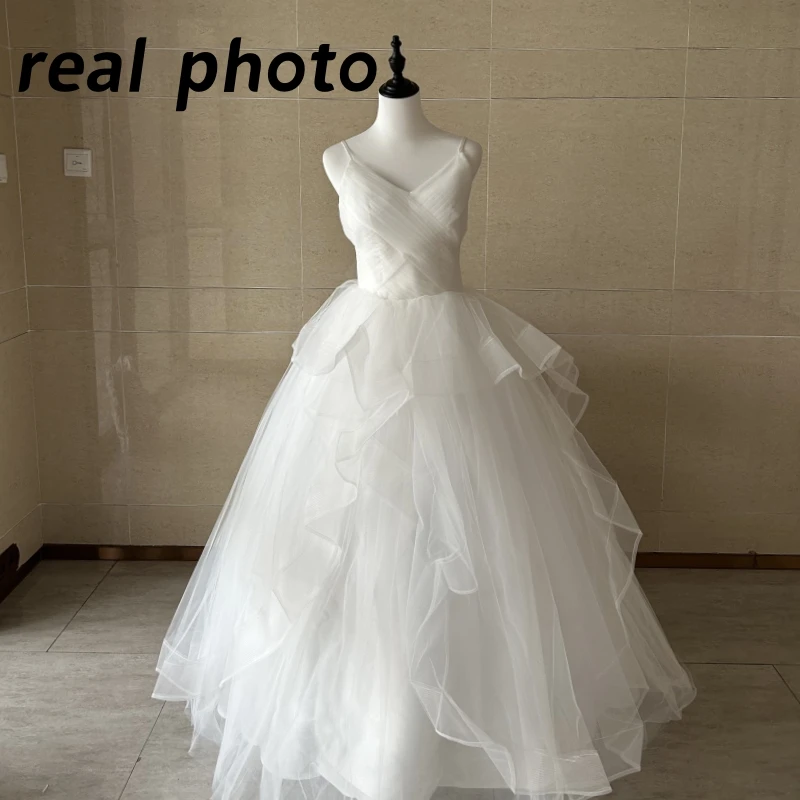 Vestido de novia con tirantes finos a la moda, vestidos de novia clásicos sexis con cuello en V, tul sencillo Sukienka Na Wesele de talla grande personalizado