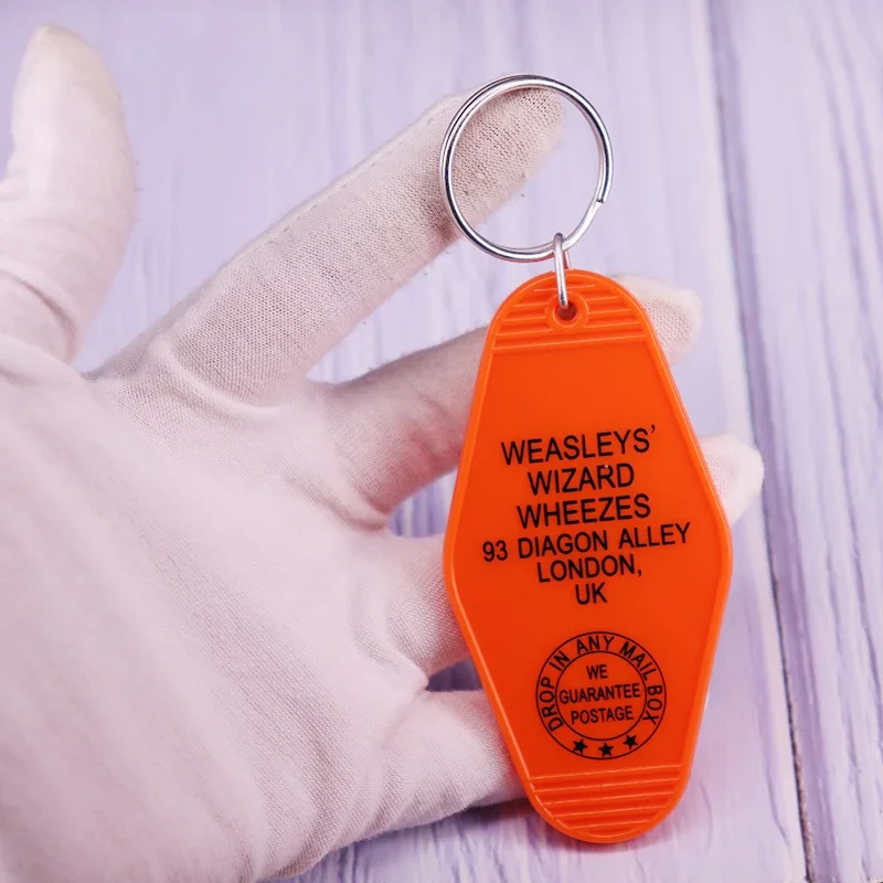 H-P Wizard World Weasleys' Wizard Wheezes porte-clés Vintage hôtel porte-clés motel porte-clés Orange cadeau de noël