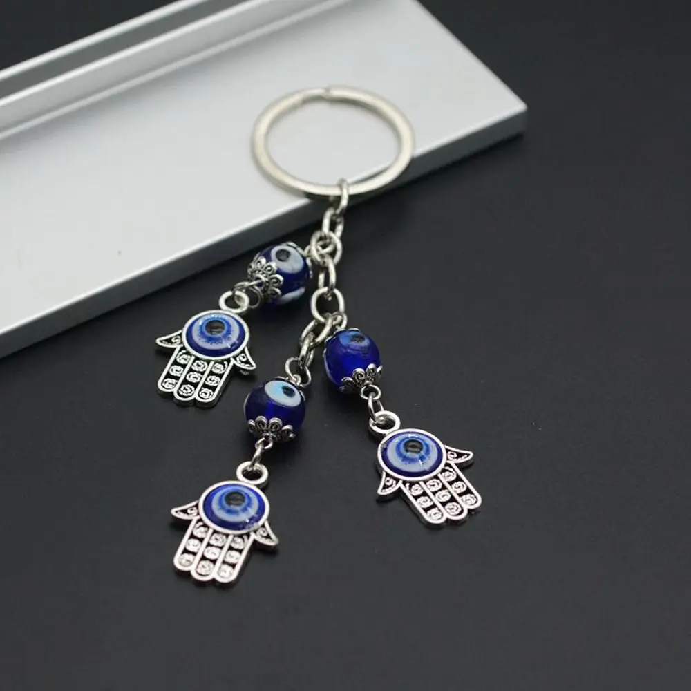 Trendy Personality Cute Cartoon Alloy Niche Design Car Key Chain Bag Accessories Fatima Hand Demon Eye Key Chain