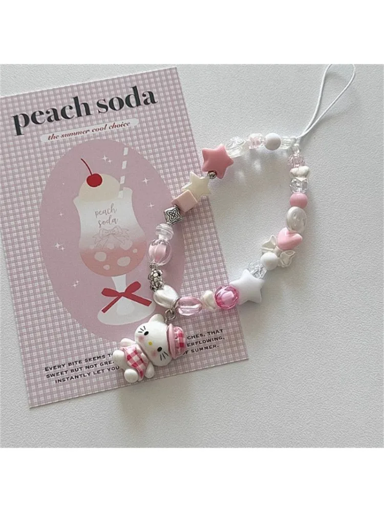 Nouvelle chaîne de téléphone Sanrio, mignonne, dessin animé, multifonctionnelle, pendentif pour appareil photo, chaîne de téléphone perlée Hello Kitty, cadeau exquis