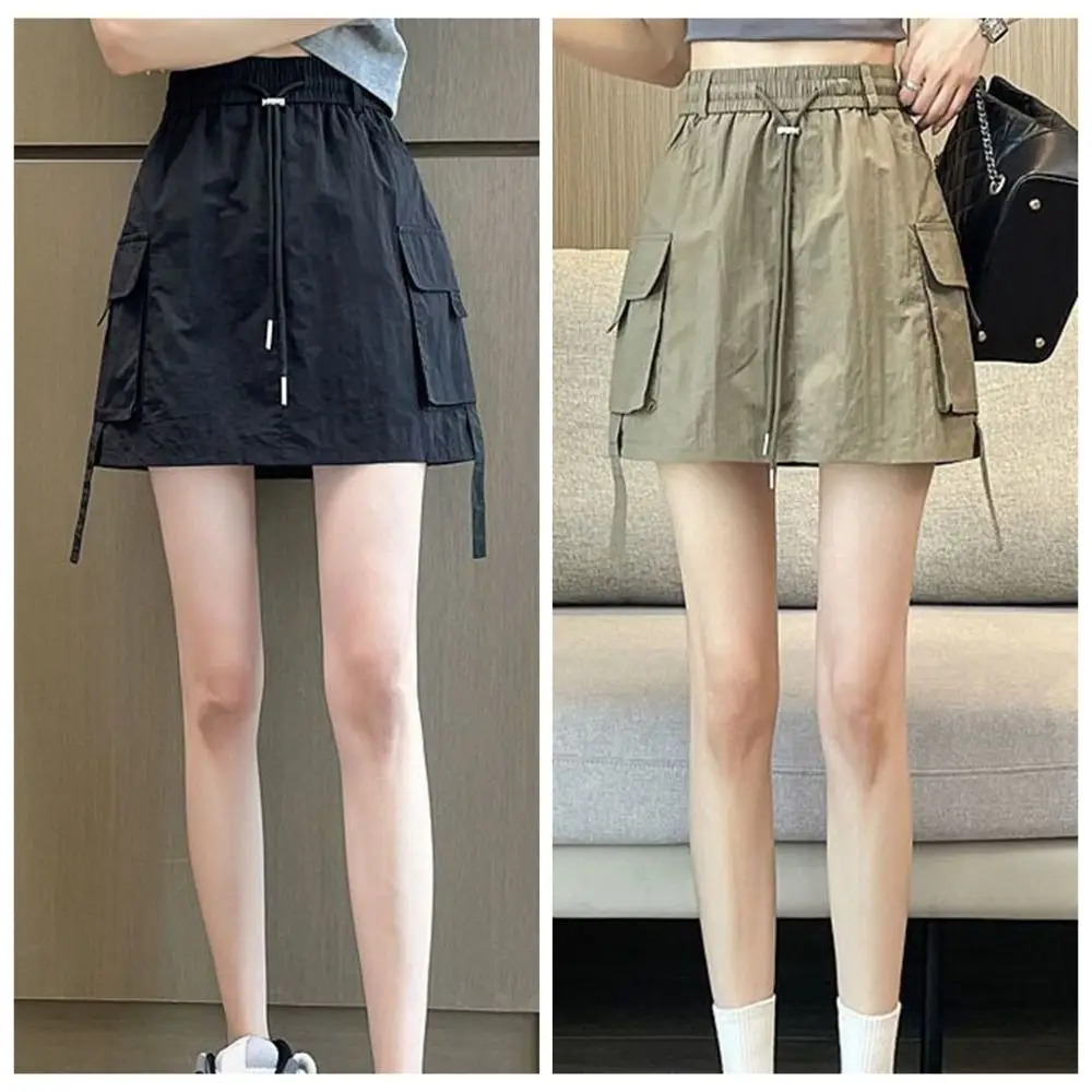 Simple ample taille haute jupe cordon à lacets jupes décontractées femmes épicé fille Style grande poche large demi jambe jupes été