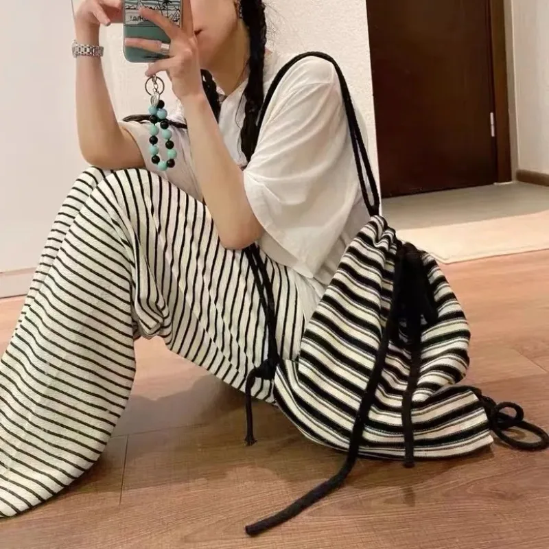 New Casual Black White Striped Canvas Backpack with Minimalist Design and Woven Straps Large Capacity Student Backpack for Class