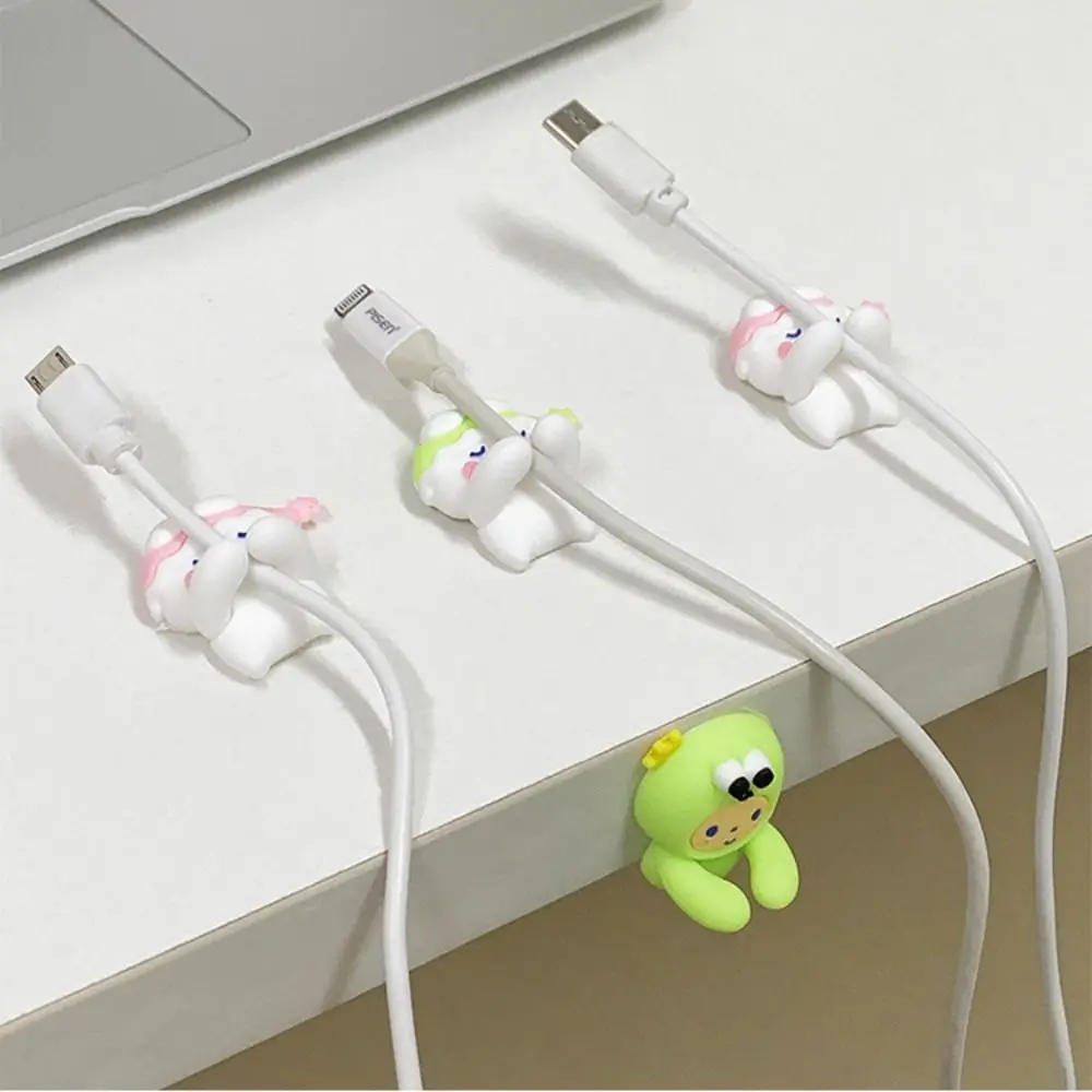 2 buah pengatur kabel kartun lucu pengisi daya USB lucu garis Data kawat kait dinding pemegang kabel Earphone kabel Winder tempat pensil meja