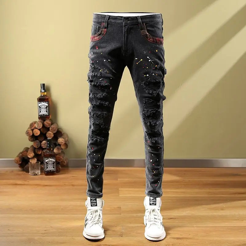 

Embroidered new style black hole patch print embellishment pattern handsome jeans man Ripped jeans