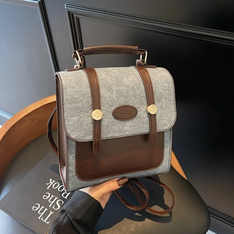 

Retro sense simple solid color niche design double shoulder bag