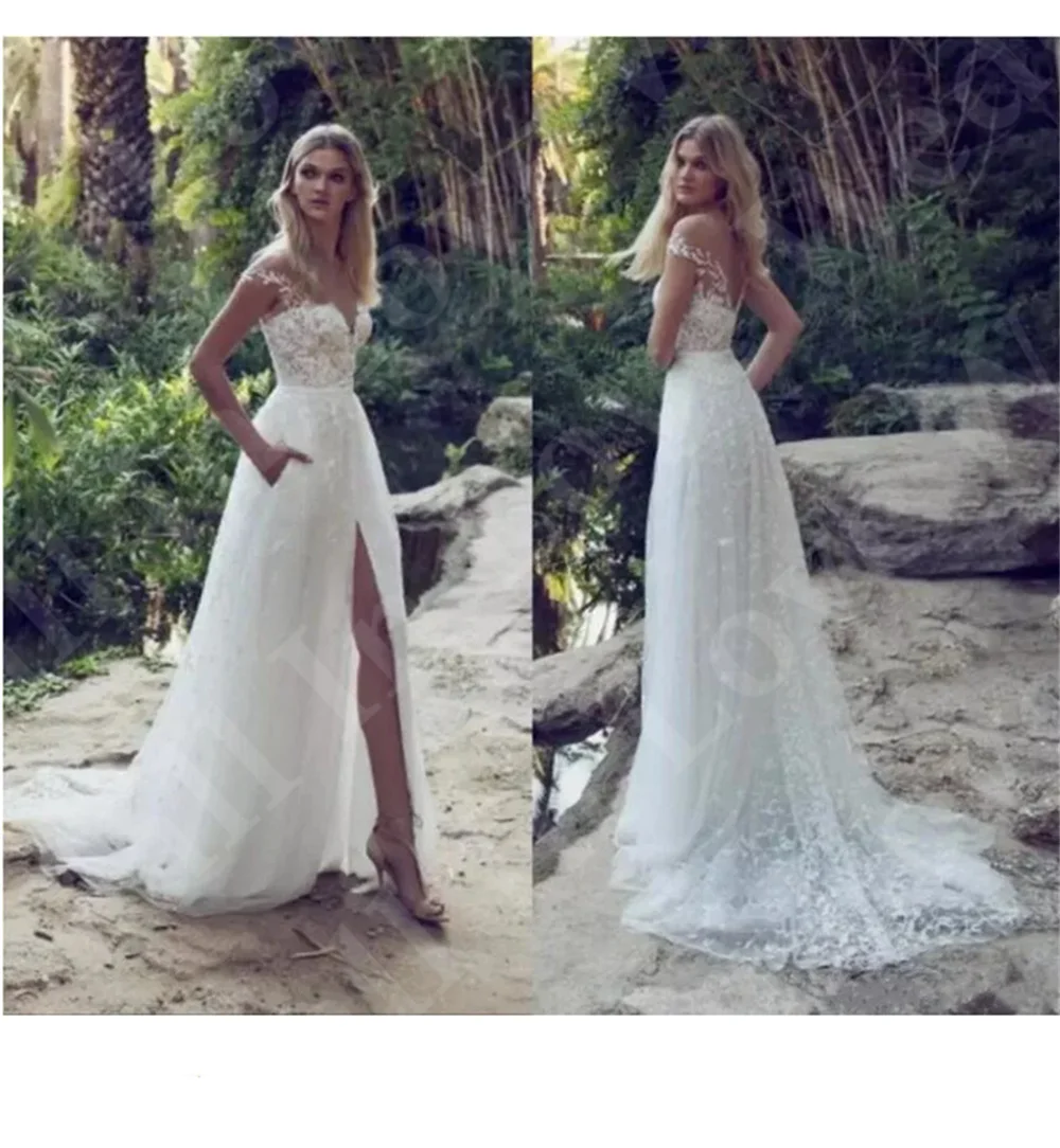 2024 New Boho A-Line Wedding Dress Off Shoulder Lace Appliques Illusion Backless Garden Beach Sweep Train Bridal Gowns Vestidos