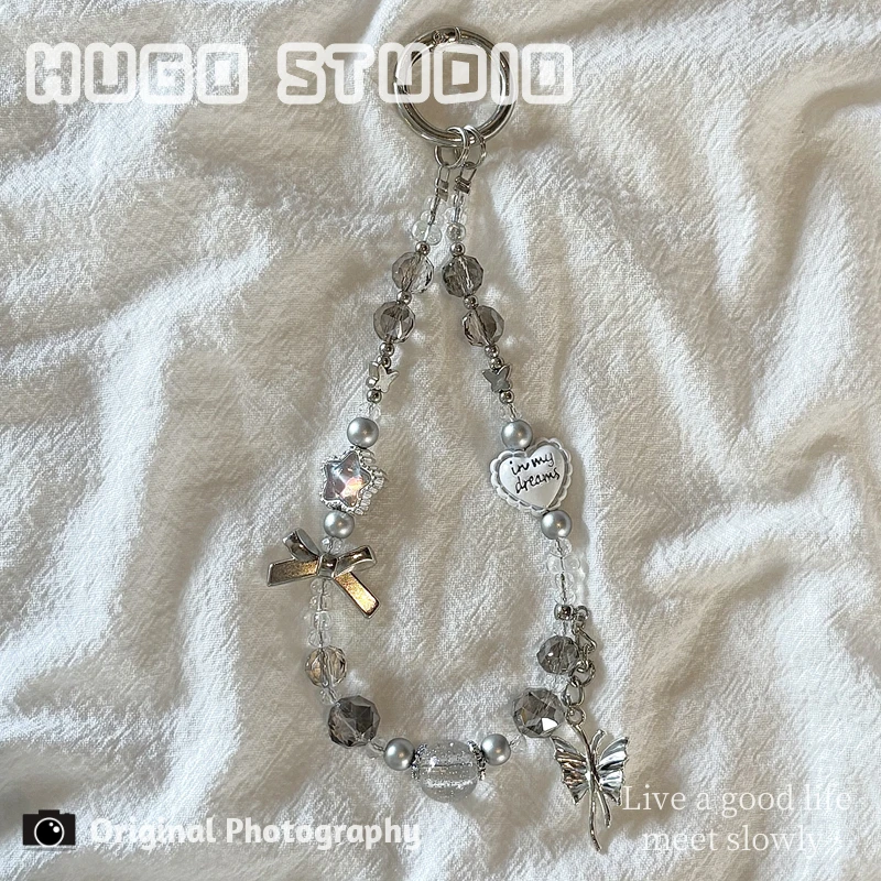 

Серебристо-серый ремешок для телефона с бантом и кристаллами, брелок-подвеска для камеры, милый и стильный девичий брелок для ключей, аксессуар для чехла телефона