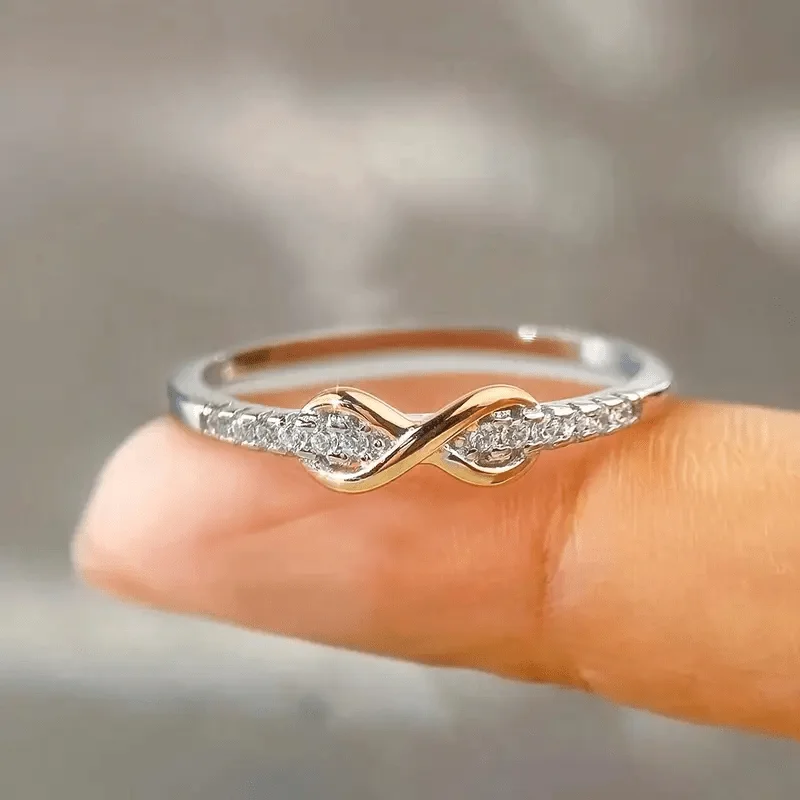 A beautiful, classic-style engagement ring featuring sparkling white cubic zirconia, elegantly plated in silver—perfect as a bridal wedding party accessory, gift, or jewelry for women.