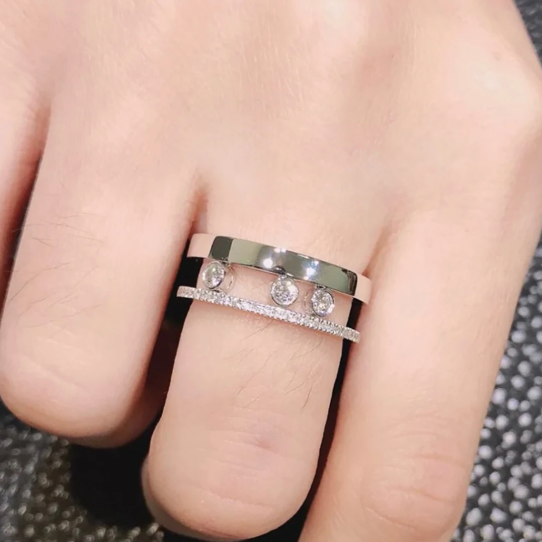 

925 sterling silver gold-plated fashionable hollow women's full diamond ring wedding ring. Sliding diamonds