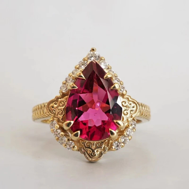 New European and American jewelry inlaid with water droplet red zircon retro palace gemstone women\'s ring