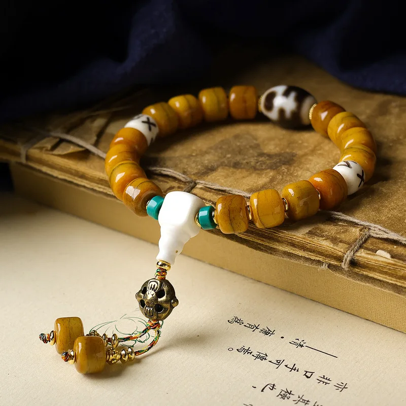 Tibetan-Style Bracelet Featuring Cracked Bone Beads And A Treasure Box Design