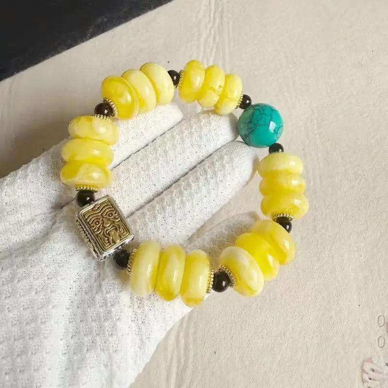 Yellow wheel paired with two-tone four mythical beast square tube beads, ethnic style amber and turquoise