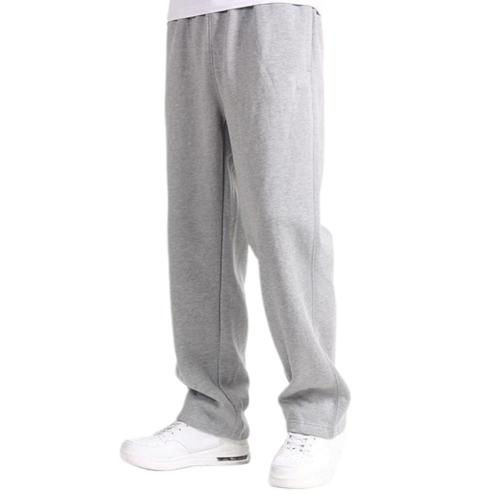 Pantaloni da jogging da uomo pantaloni sportivi autunnali primaverili pantaloni larghi elastici solidi con tasche abbigliamento sportivo pantaloni da tuta da uomo