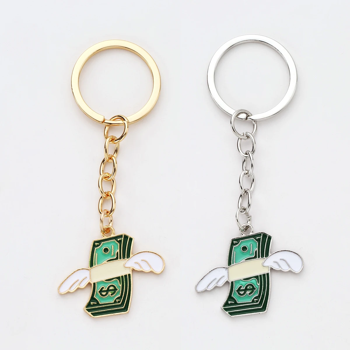Fashionable Winged Dollar Keychain in Gold-Tone Alloy. A Creative and Symbolic Money Gift Idea for Birthdays and Celebrations.