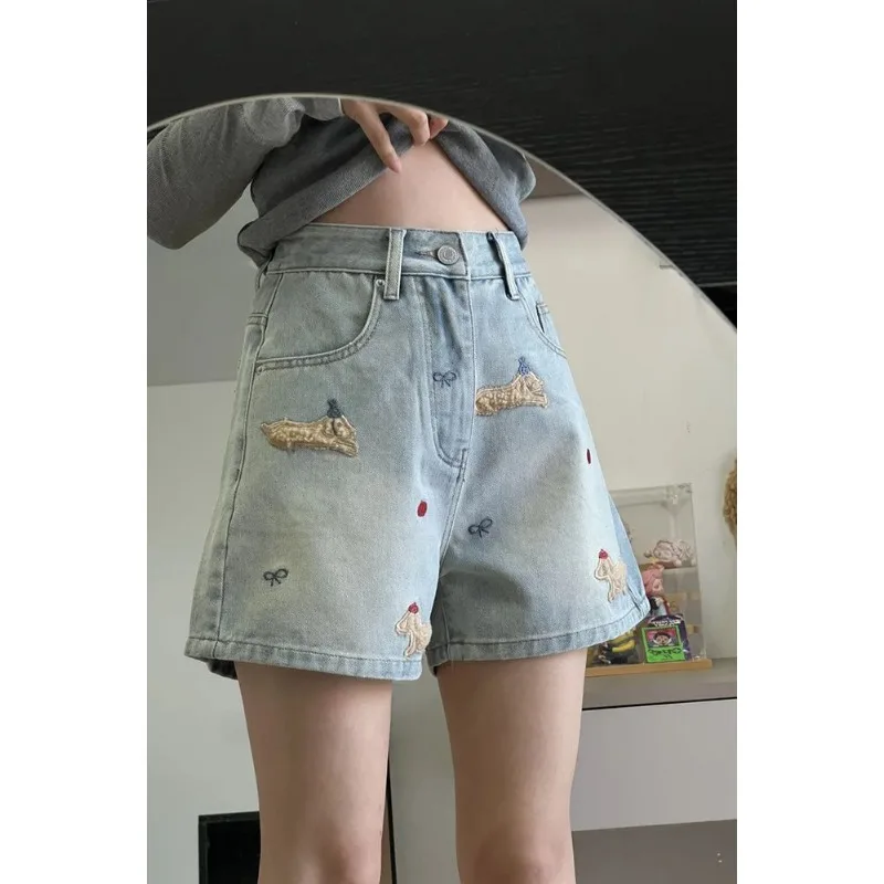 Women's Light Wash Denim Mini Skirt with 3D Dog Embroidery Detail