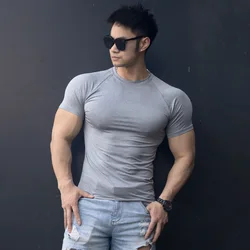 Palestra uomo estate Fitness sport Casual Slim t-shirt da uomo manica corta Slim Muscle Outdoor Fashion Bodybuilding abbigliamento stretto