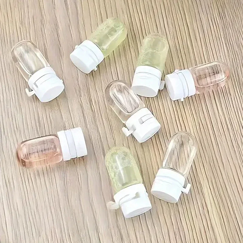 2/5 pces garrafa transparente de viagem vazia essência à prova de vazamento engarrafada com recipientes cosméticos de vidro flip-top removedor de maquiagem & loção