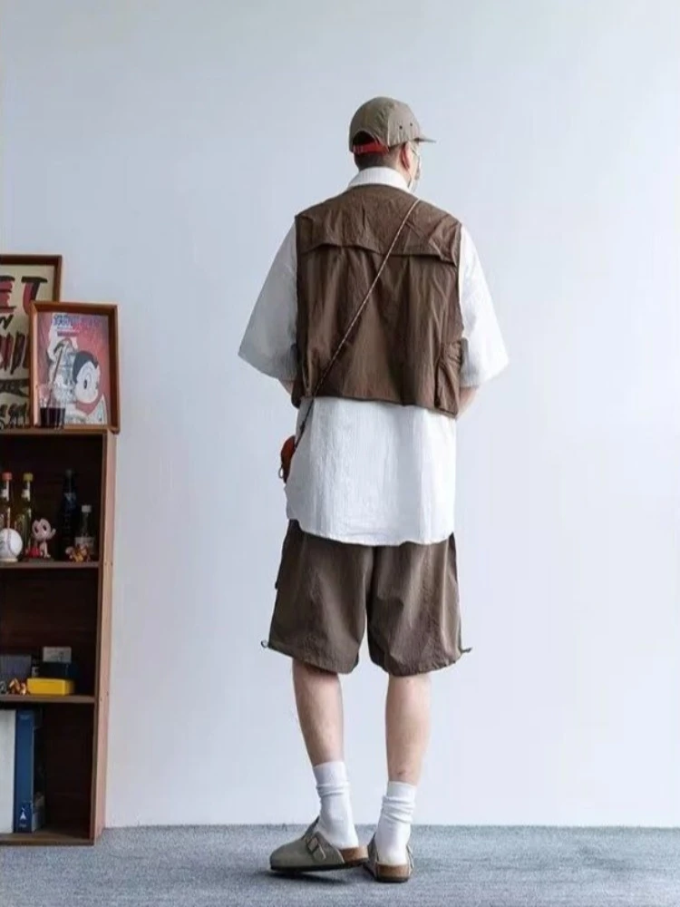 

Breathable Quick Dry Sleeveless Jacket for Men Retro V Neck Multi Pocket Hiking Vest with Pockets​