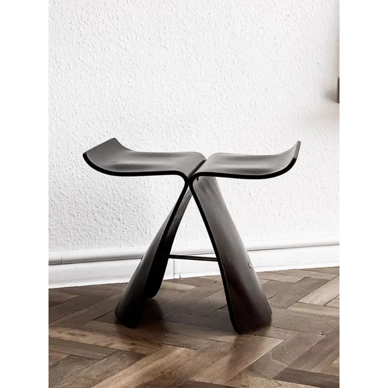 

Nordic solid wood designer stool, casual fashion creative shoe changing stool edge butterfly stool, single sofa pedal