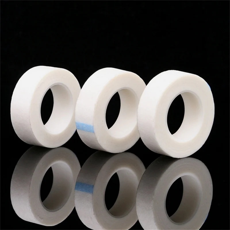 5/10/50/100PCS 9M * 1.25CM Nastro Bianco Occhio Ciglia Finte Patch Traspirante Nastri di Carta Medica Estensione Delle Ciglia Lint Palpebra adesivo