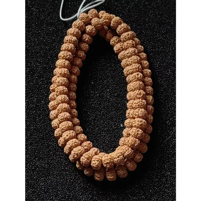 

Браслет из 108 частей с семенами деревьев, из Индонезии