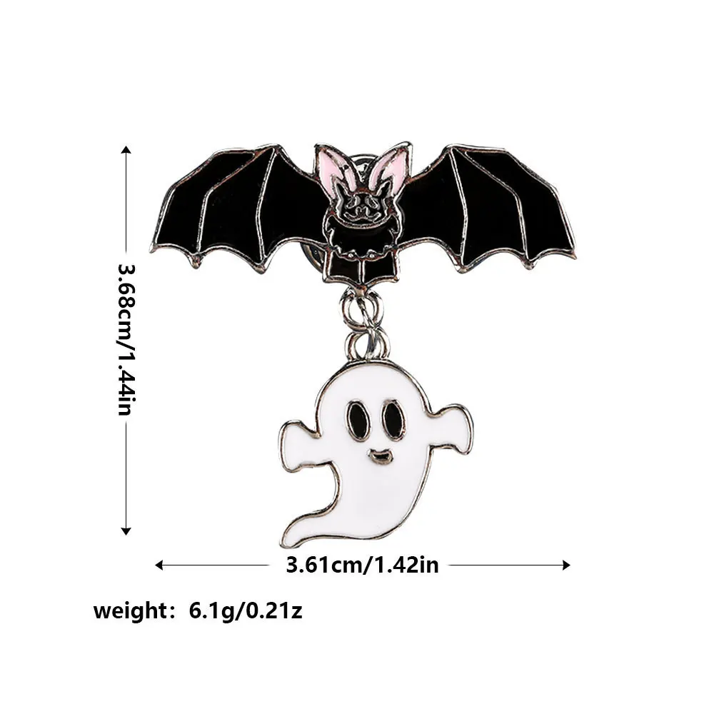 A Halloween pumpkin dark themed accessory brooch with a unique minimalist punk style bat skull badge