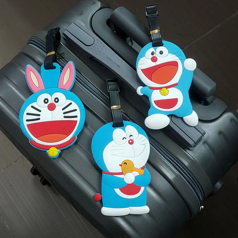 Doraemon animatie perifere cartoon kawaii koffer gecontroleerd instappas reizen naar het buitenland anti-verlies kaart reisbenodigdheden