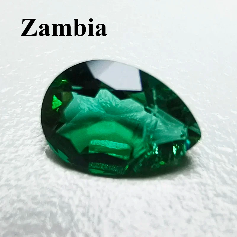 

Lab Grown Zambian Emerald Pear Shape Hydrothermal Hand Cutting Cut with Cracks Inclusions Inside Selectable AGL Certificate