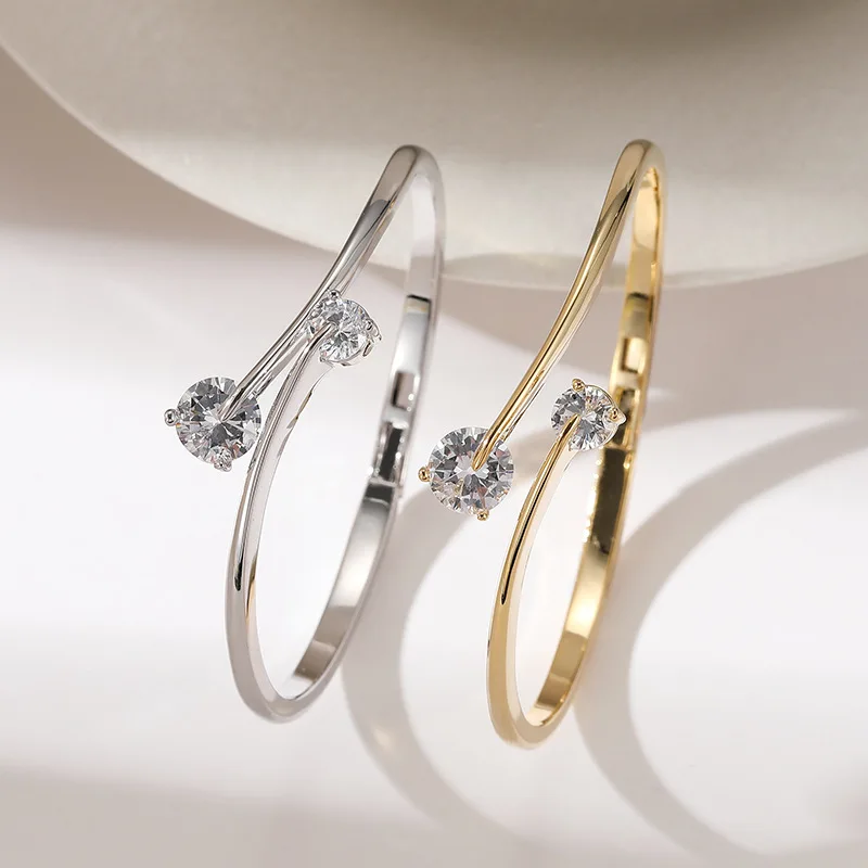 

Lightweight luxury gold-plated copper bracelet -- cross design, polished large round cubic zirconia.