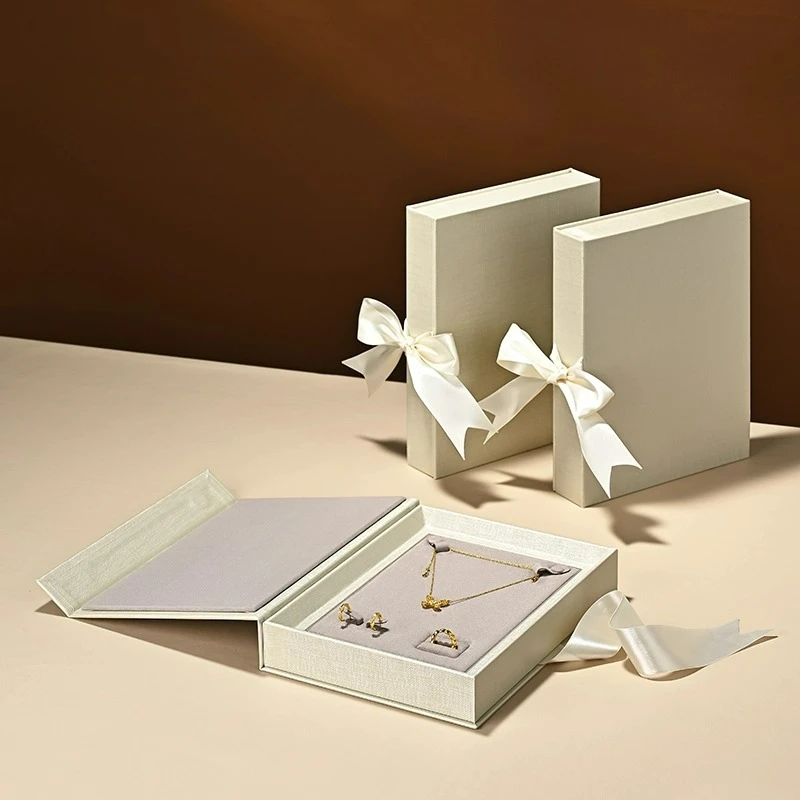 

Jewelry storage box, book box, flip cover, creative ribbon design, ring, necklace, jewelry display gift box