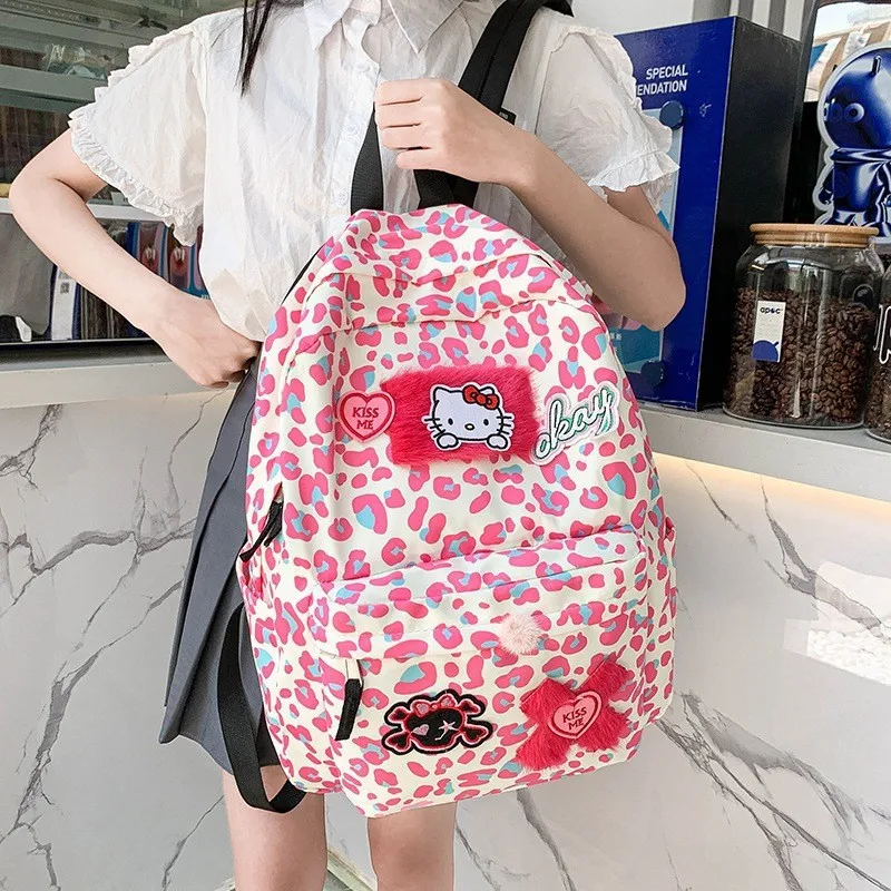 

New Sanrio Hello Kitty Fashion Backpack Sister Cute Pink Leopard Print Schoolbag Sweet Cartoon Animation Zipper Student Bag Girl