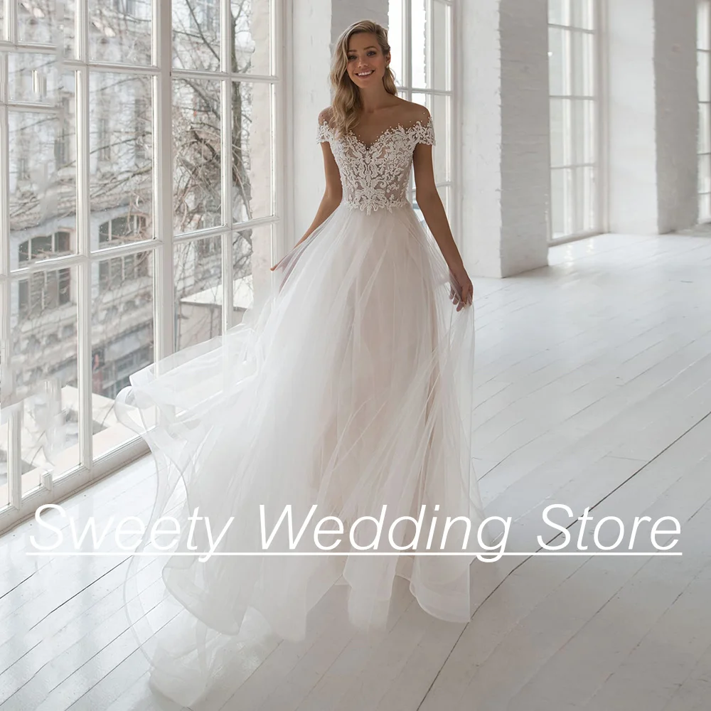 

Vestido De Noiva Wedding Dresses Charming Sheer O-Neck Short Sleeves Pearls Applique Tulle A-line Illusion Boho Gowns