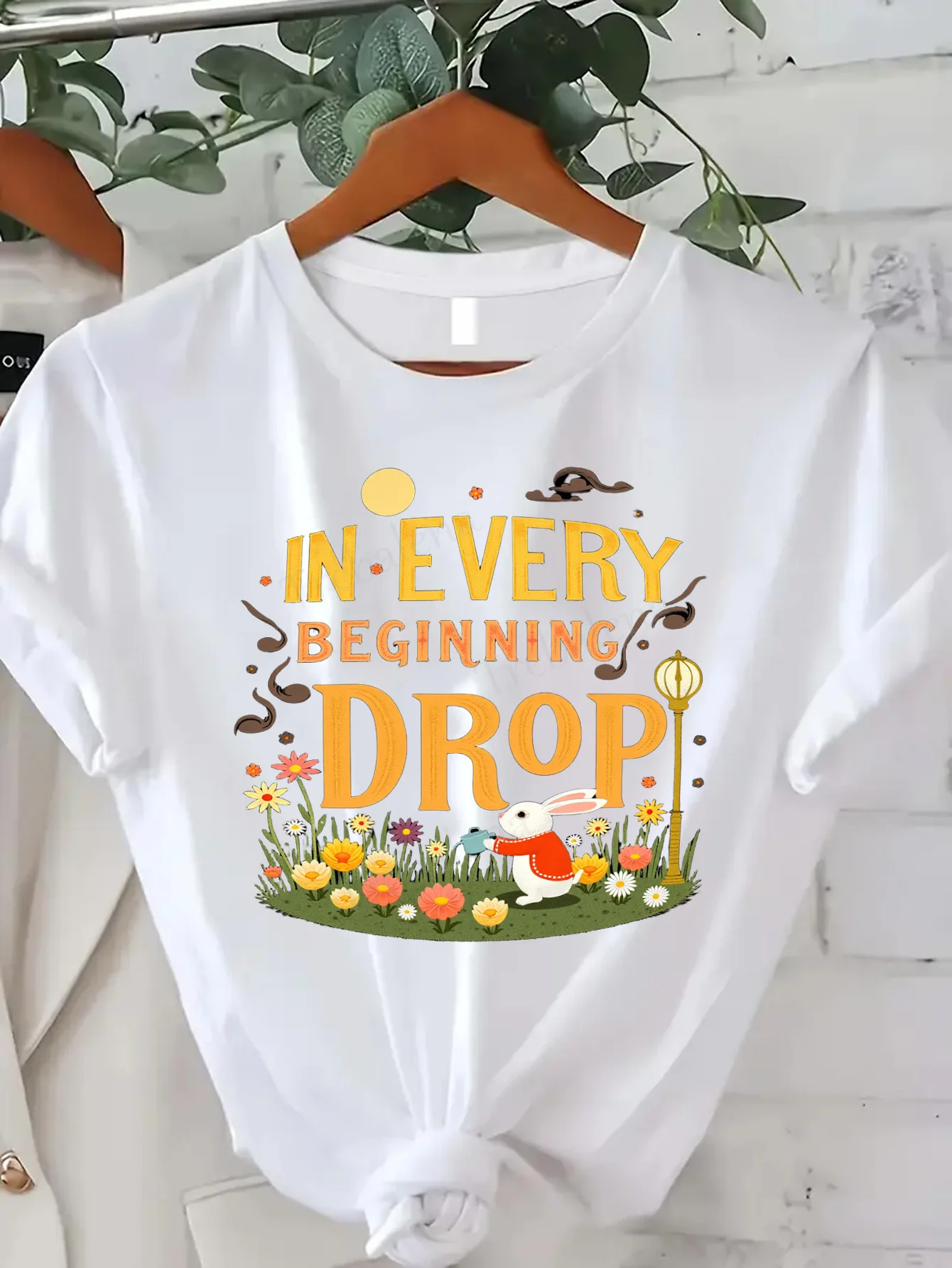 

Comfortable Women's Print T-shirt "Spring Floral 'In Every Beginning Drop' Graphic Tee for Women"