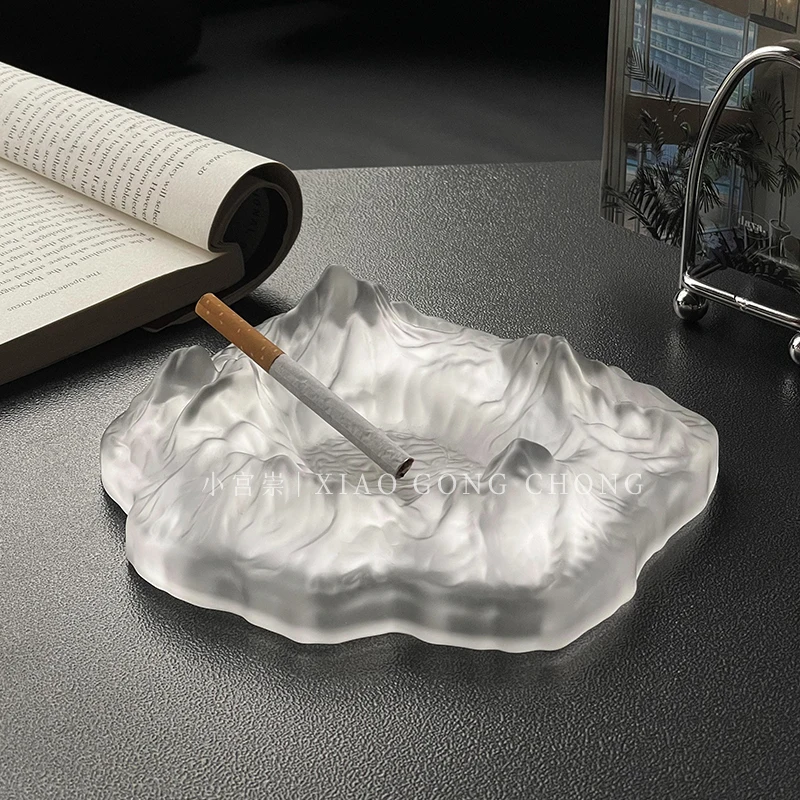 

Nordic wind iceberg ashtray household luxury fashion frosted snow mountain ornaments ins wind living room decorative cigar jar.