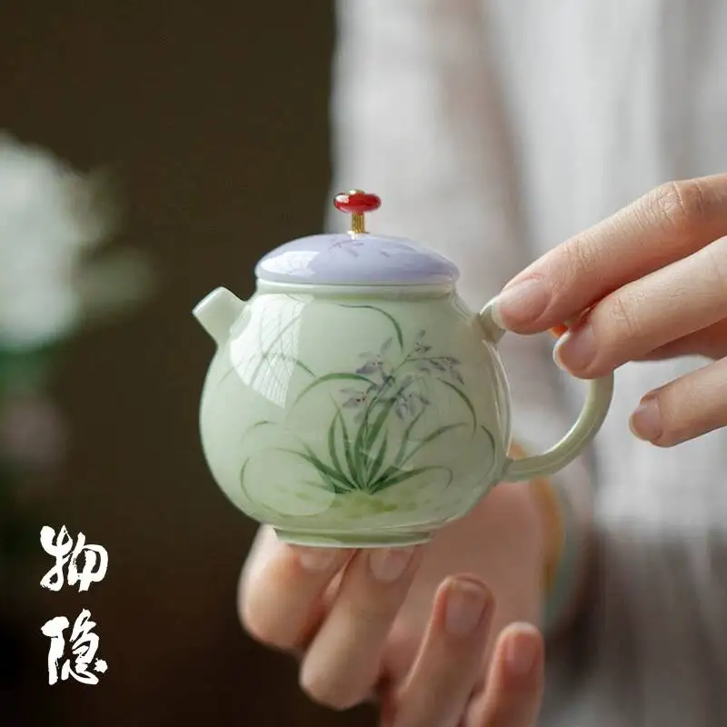 

Wuyintang Underglaze Color Hand Painted Orchid Teapot Handmade Ceramic Pot Single Pot With Filter Kung Fu Tea Set