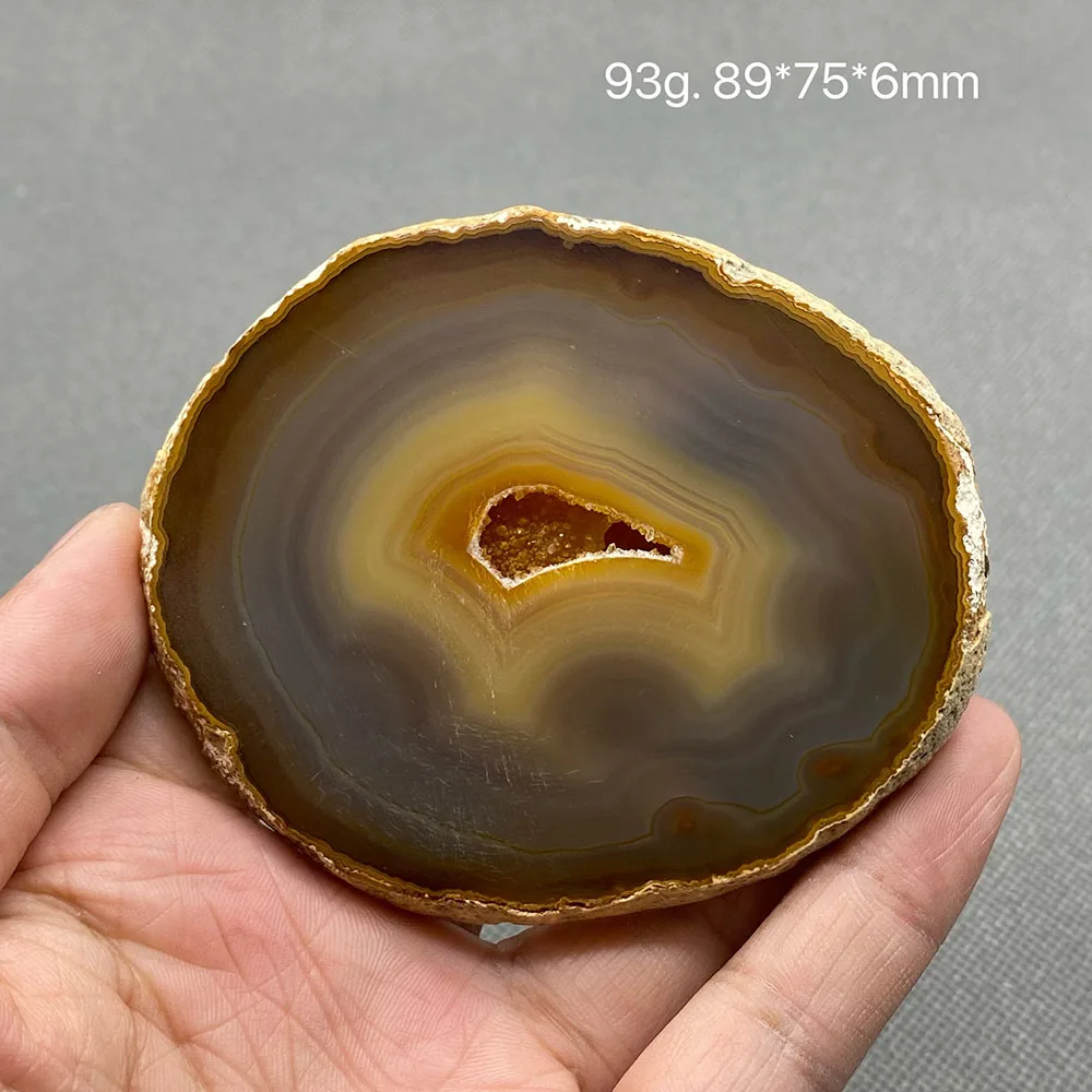 Natural agate slice polished ore specimen with crystal hole