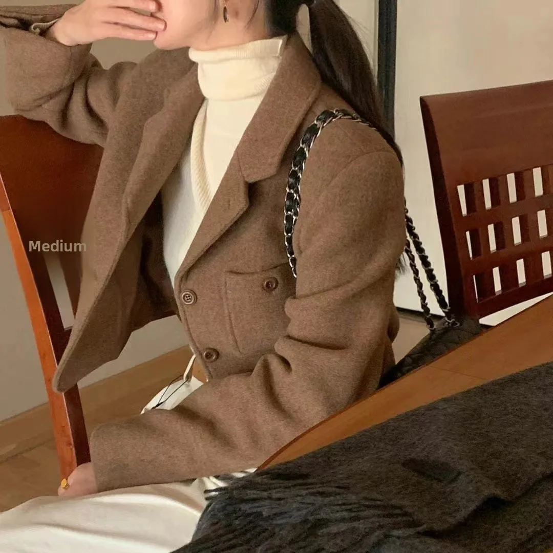 

Retro Sle ort Woolen Coat Spring Autumn 2026 Single Button Multiple kets Suit Collar Faionable Ladies Jaet
