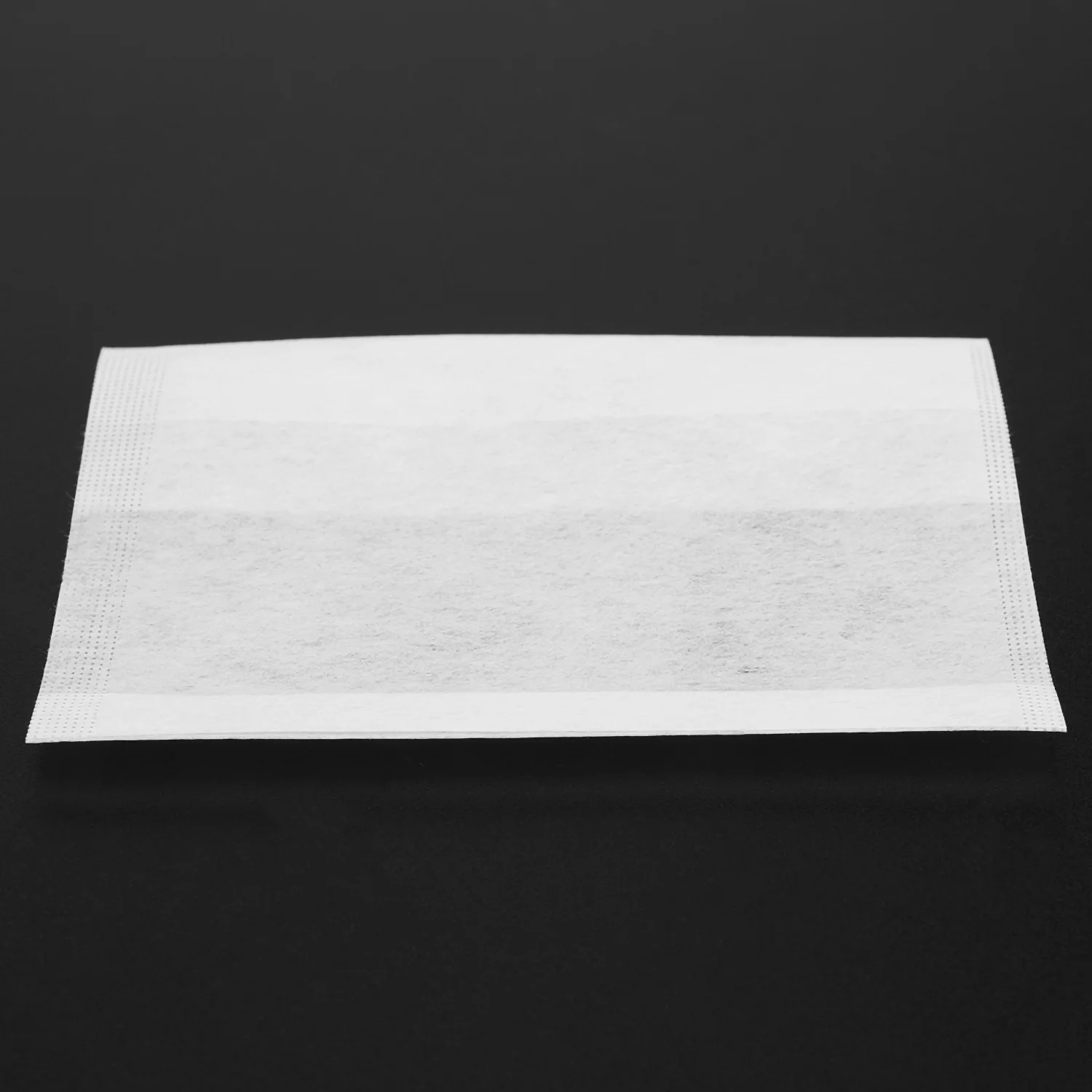 500 PCS/เป็นมิตรกับสิ่งแวดล้อมเส้นใยข้าวโพดธรรมชาติพับถุงชาย่อยสลายได้ชากรองถุงกรองชา 7X10 ซม.