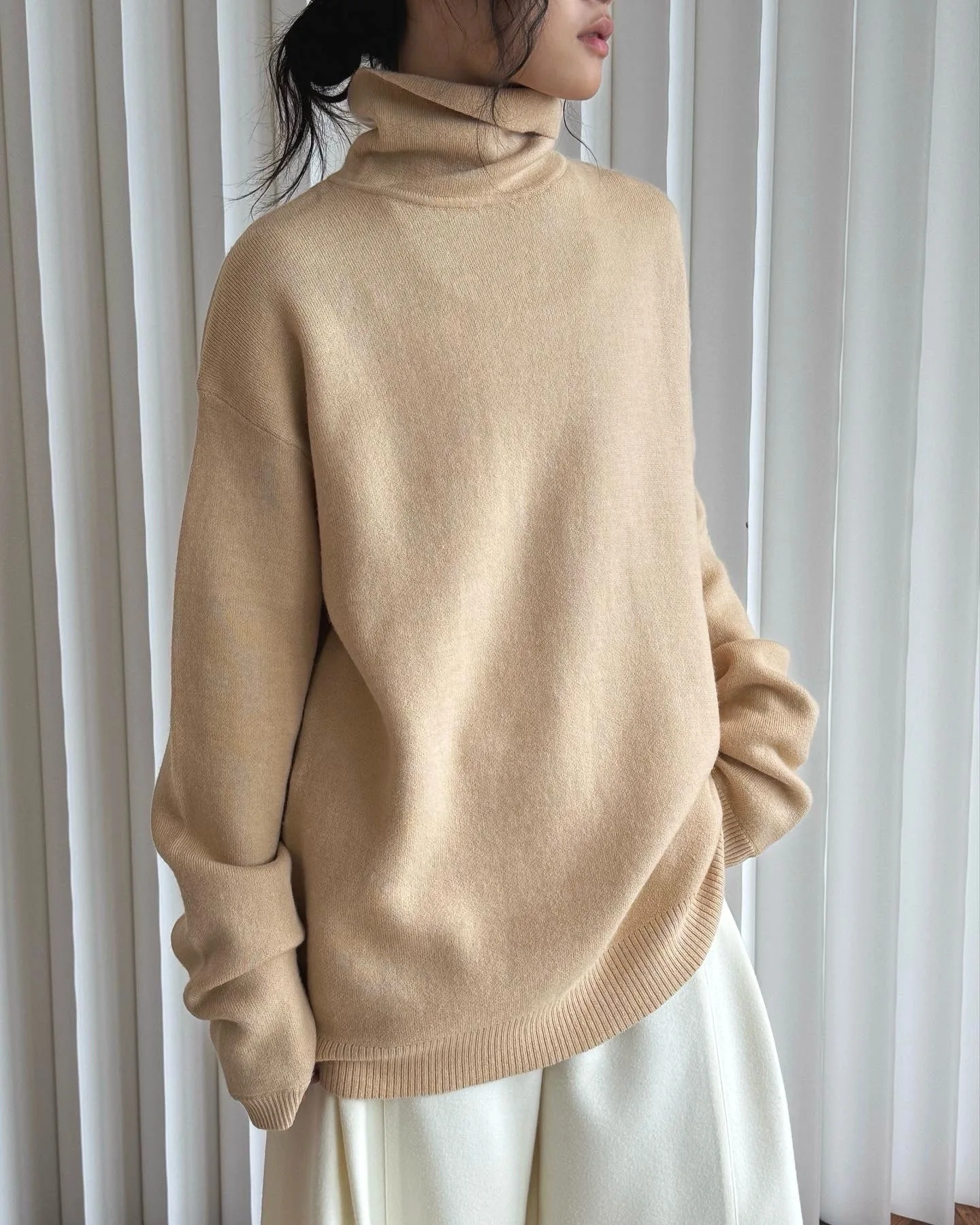 Winter women\'s casual solid color high neck long sleeved loose sweater