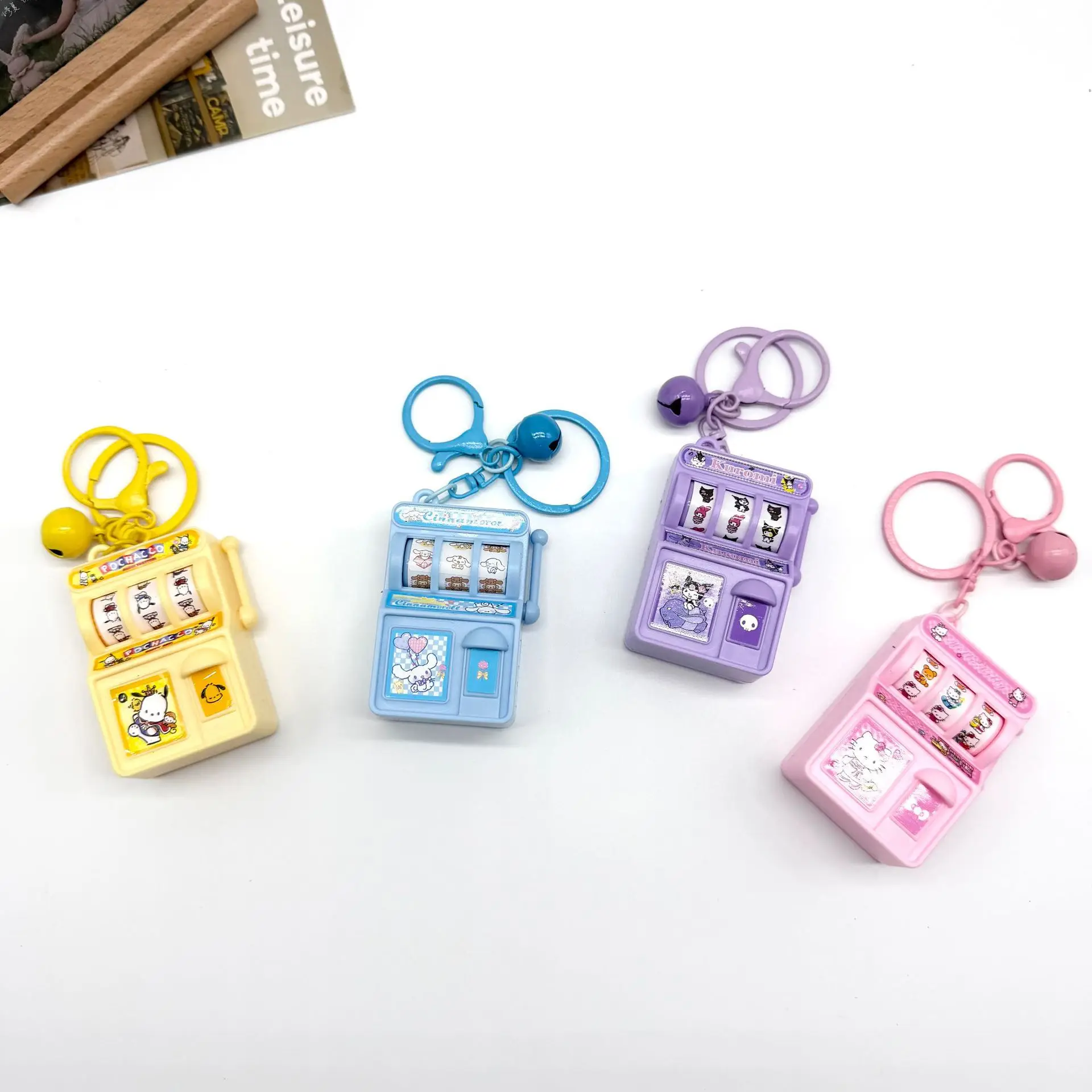 

Mini Kawaii Hello Kitty Kuromi My Melody Cinnamon Slot Machine keychain Turnable Very Interesting Stress Relief Child Gift Toys