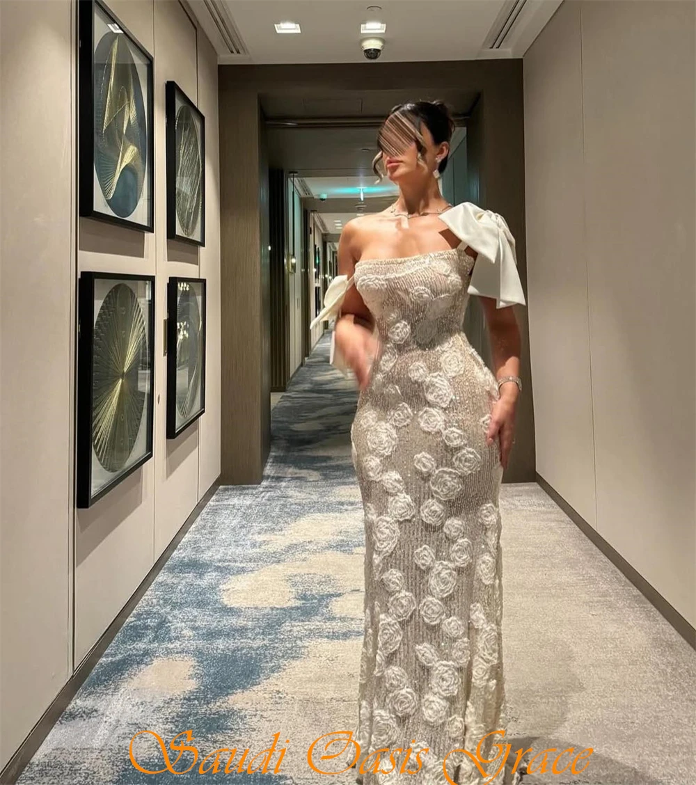 ชุดราตรีผ้าออร์แกนซ่าสีเบจเรียบง่ายแบบสั่งตัด ชุดออกงานแบบไหล่เดียวไม่มีแขน ชุดงานเลี้ยงรับปริญญาทรงเมอร์เมดผ้าเนื้อนุ่ม ประดับโบว์ ชุดราตรีแบบดารา