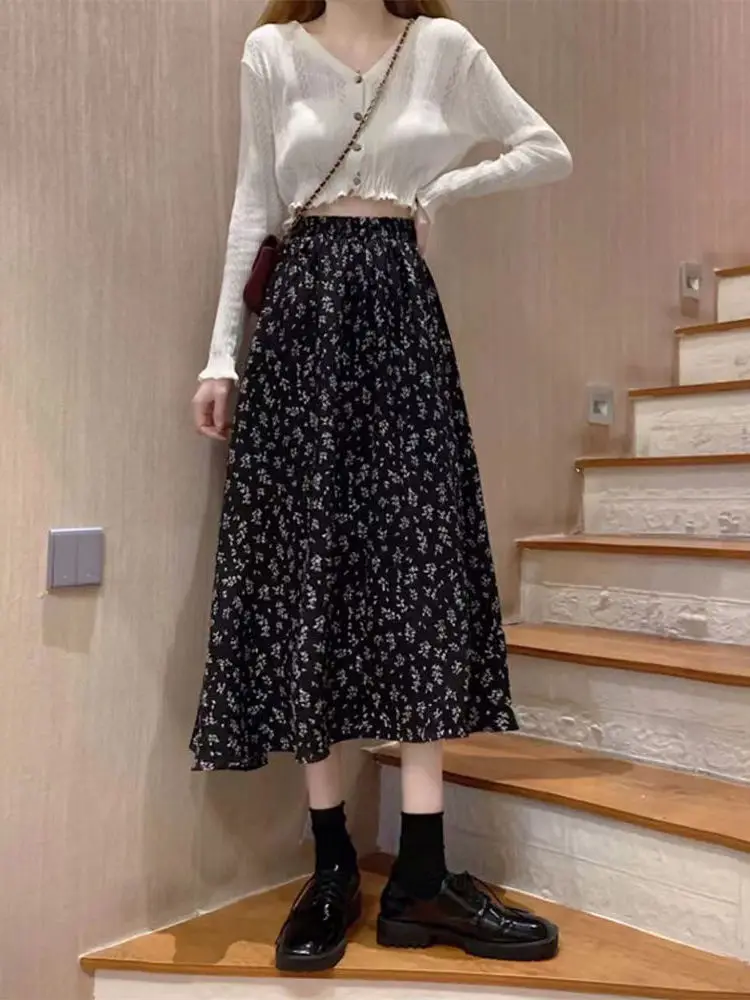 Spódnica midi w kwiatowy wzór plus size, rozkloszowana, wyszczuplająca, zakrywająca biodra, wiosenno-jesienna, damska, codzienna, z wysokim stanem, z włókna poliestrowego.