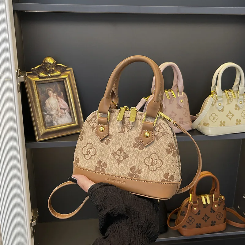 

2025 Womens Monogram Shell Bag Vintage Shoulder Crossbody Purse Retro European Style Top Handle Handbag Small Designer Purse​​